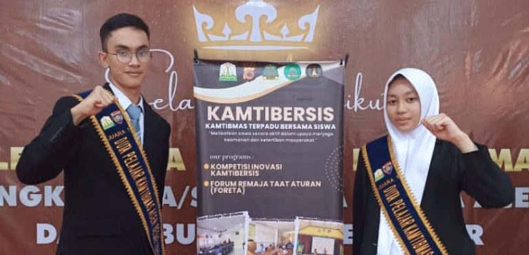 Rais Muda dan Faulina Iffani  Juara 1 Seleksi Duta Pelajar Kamtibmas Putra dan Putri Aceh Besar